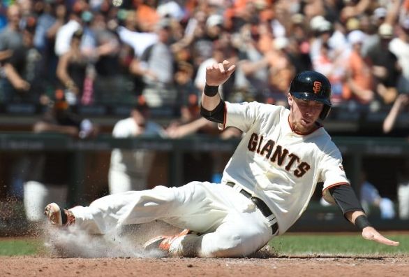 Five-run inning lifts Giants past Brewers