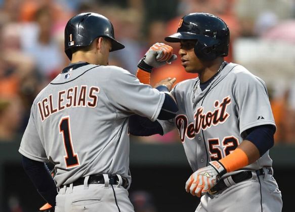Depleted Tigers get 16 hits and squeeze past Orioles 9-8