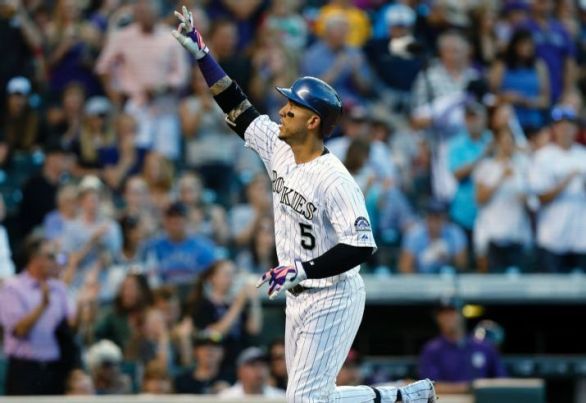 Gonzalez homers to lead Rockies over Braves 5-3