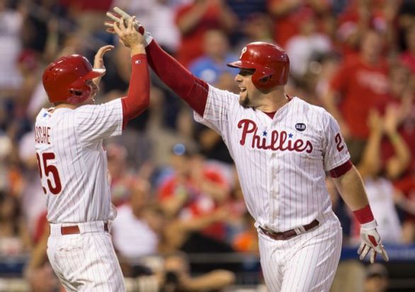 Phillies hit 3 HRs in 12-2 win over Braves
