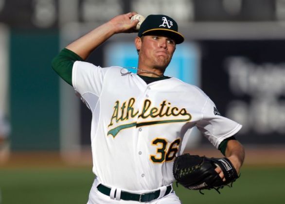 Brooks earns first career win in A's debut, 5-1 over Indians