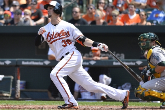 Orioles use 26-hit attack to beat A's 18-2