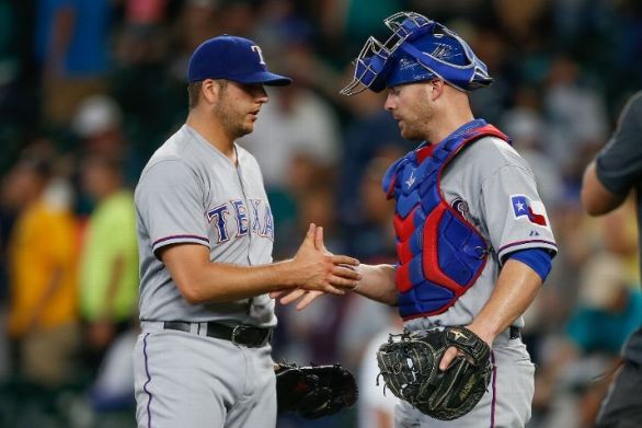 Rangers score 8 times in 11th inning to beat Mariners 11-3