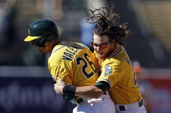 Valencia powers A's to 5-4 victory over Astros