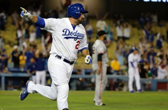 Gonzalez's bases-loaded single lifts Dodgers past Giants in 14th