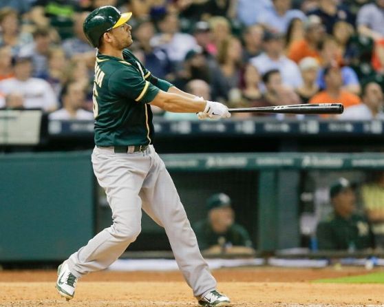 Valencia's 2 homers lead A's over fading Astros 4-3