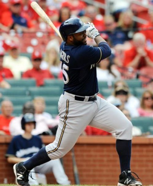 Rogers' grand slam in 9th rallies Brewers past Cardinals