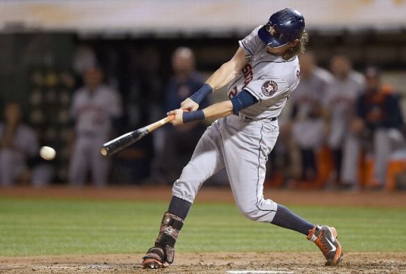 Astros hit 4 homers, McHugh wins 16th in 11-5 win over A's