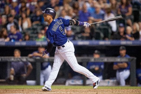 Rockies hit 3 homers in 4th inning, beat Dodgers 7-4