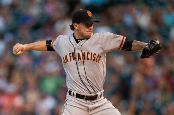 Peavy pitches, hits Giants to 7-3 win over Rockies