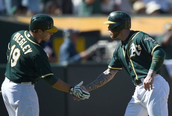 Mike Fiers loses as first-place Astros fall to A's 10-9