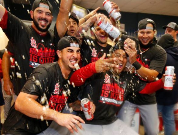 Cardinals put away Pirates to clinch third straight NL Central title