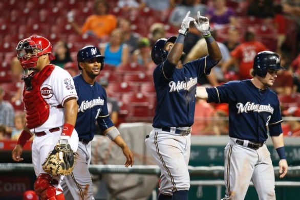 Rookies Pena, Peterson help Brewers sweep Reds in twin bill