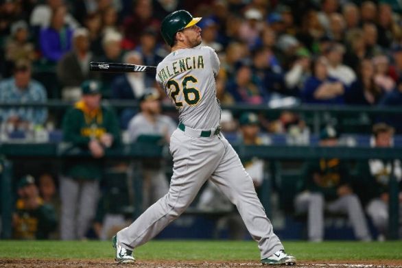 Mariners acquire Danny Valencia from A's for Paul Blackburn