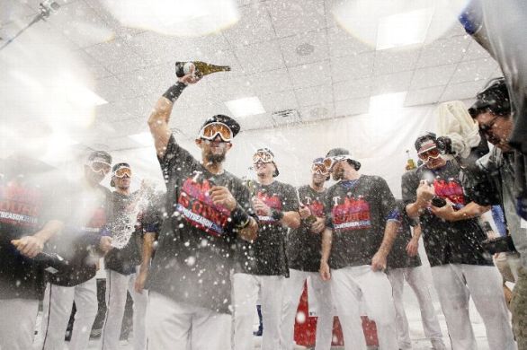 Rangers win AL West on final day; Angels' loss puts Astros in playoffs