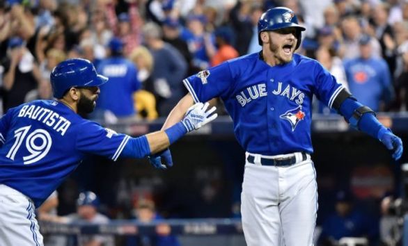 Back home, Blue Jays break out to beat Royals 11-8 in Game 3