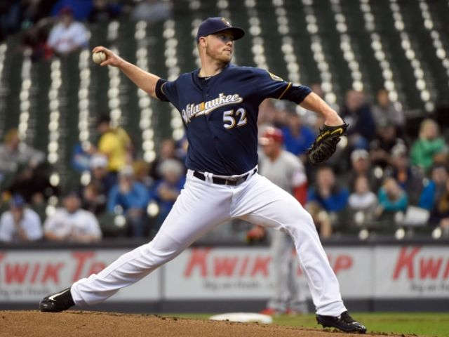 Nelson's pitching, hitting lead Brewers past Angels 8-5