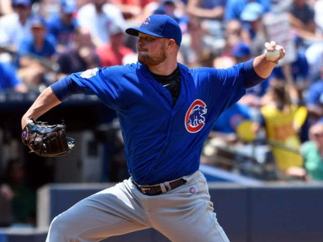 Lester allows no earned runs as Cubs rout Braves 13-2
