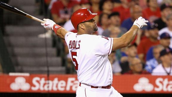 Pujols smacks 2 3-run HRs, takes pitch to helmet in Angels' win