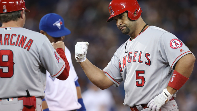 Pujols reaches 100 RBIs for 13th time, Angels beat Jays 6-3