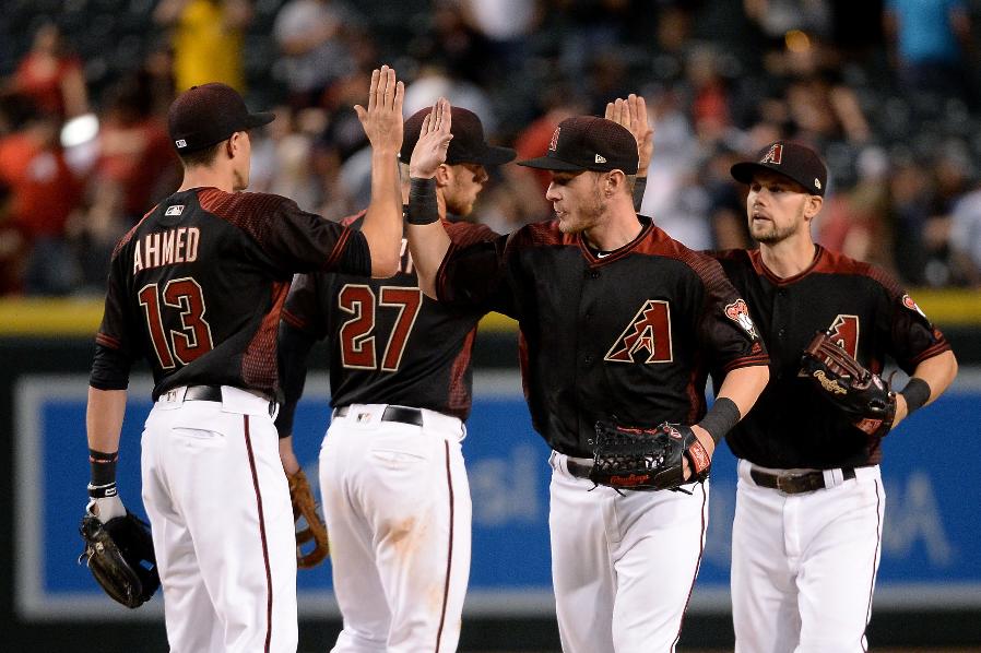 D-backs rally again, erupt late to crush Indians