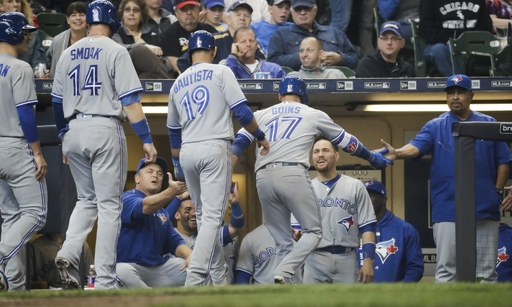 Goins' slam 1 of 4 HRs for Blue Jays in 8-4 win over Brewers