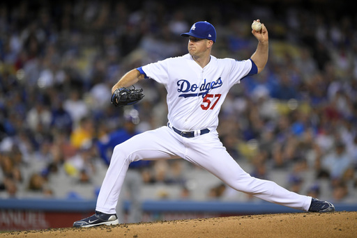 Wood stays undefeated as Dodgers blank Cubs 4-0
