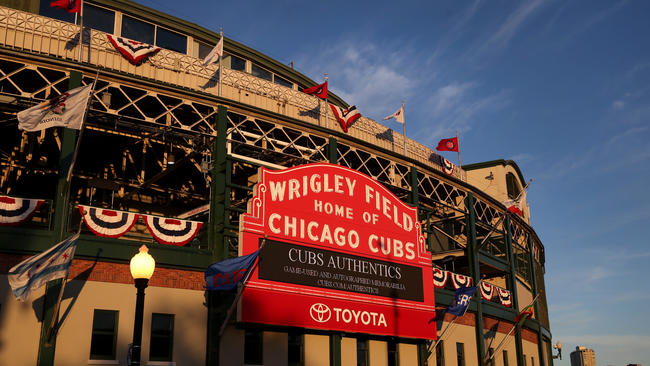 Cubs fan dies after falling over railing at Wrigley